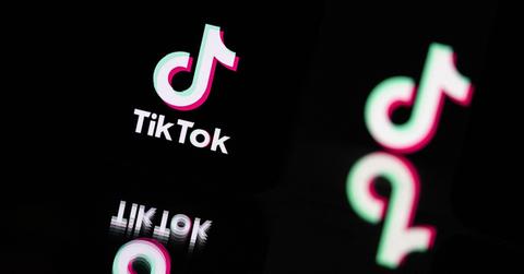 TikTok logo and a reflection below it.