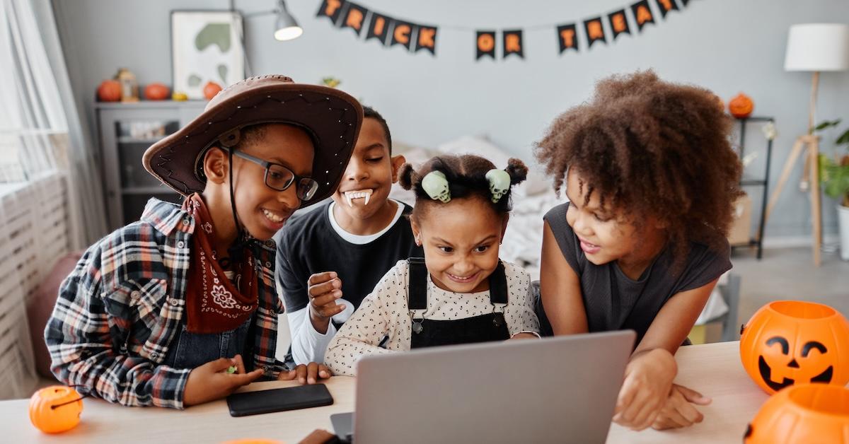 Halloween kids on a computer