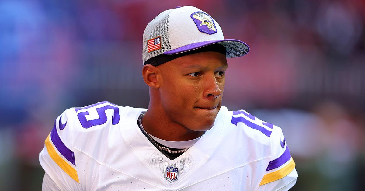 Josh Dobbs in a Vikings hat during a game against the Falcons. 