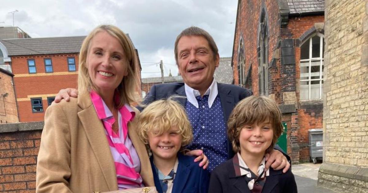 (l-r): Gary "Mani" Mounfield's wife, Imelda, his twin sons, and Gary "Mani" Mounfield