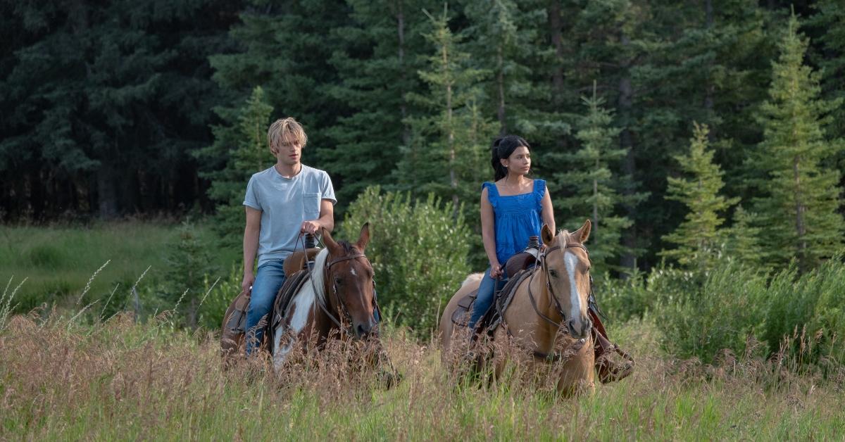 Cole (Noah LaLonde) and Jackie (Nikki Rodriguez) ride horses in 'My Life with the Walter Boys'