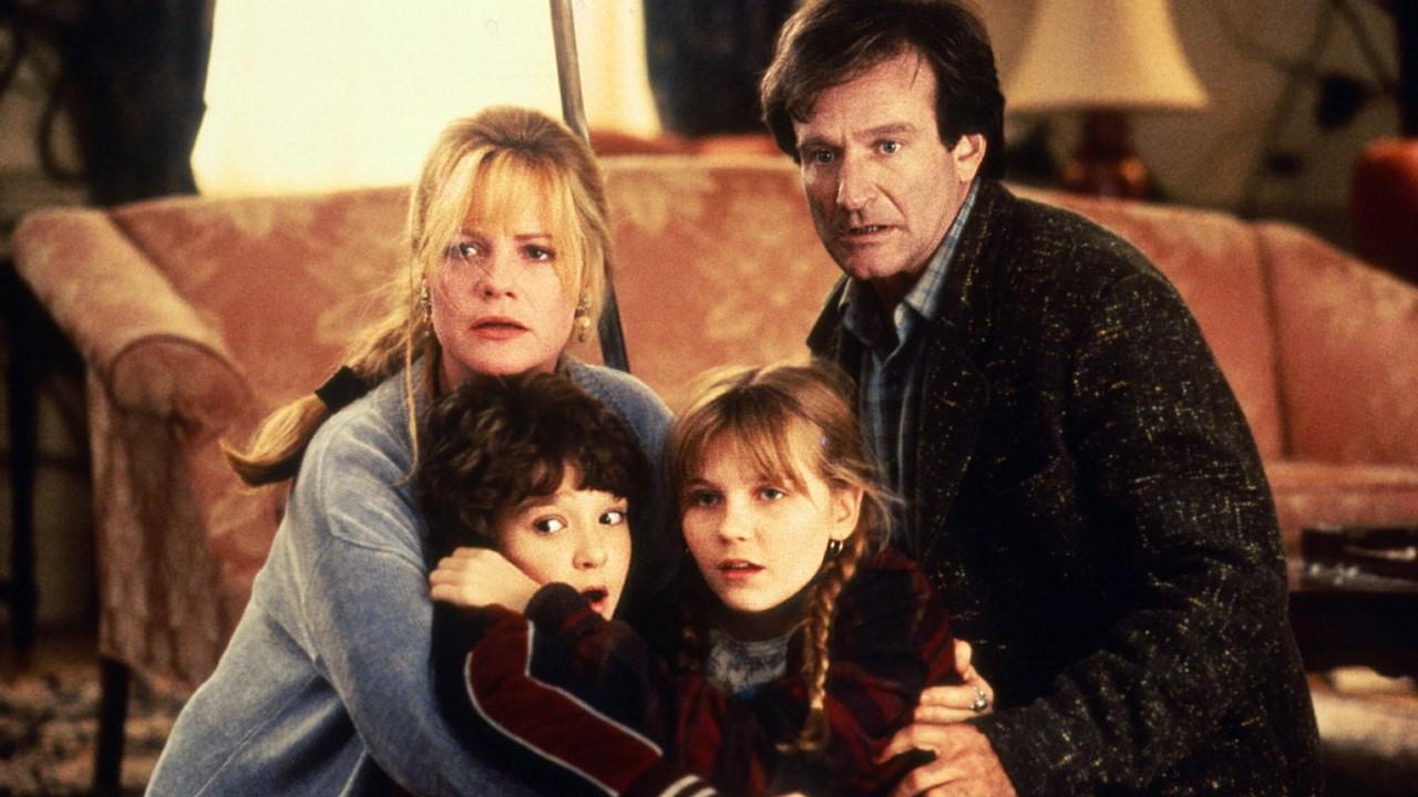 Robin Williams, Bonnie Hunt, Kirsten Dunst, and Bradley Pierce in 'Jumanji'
