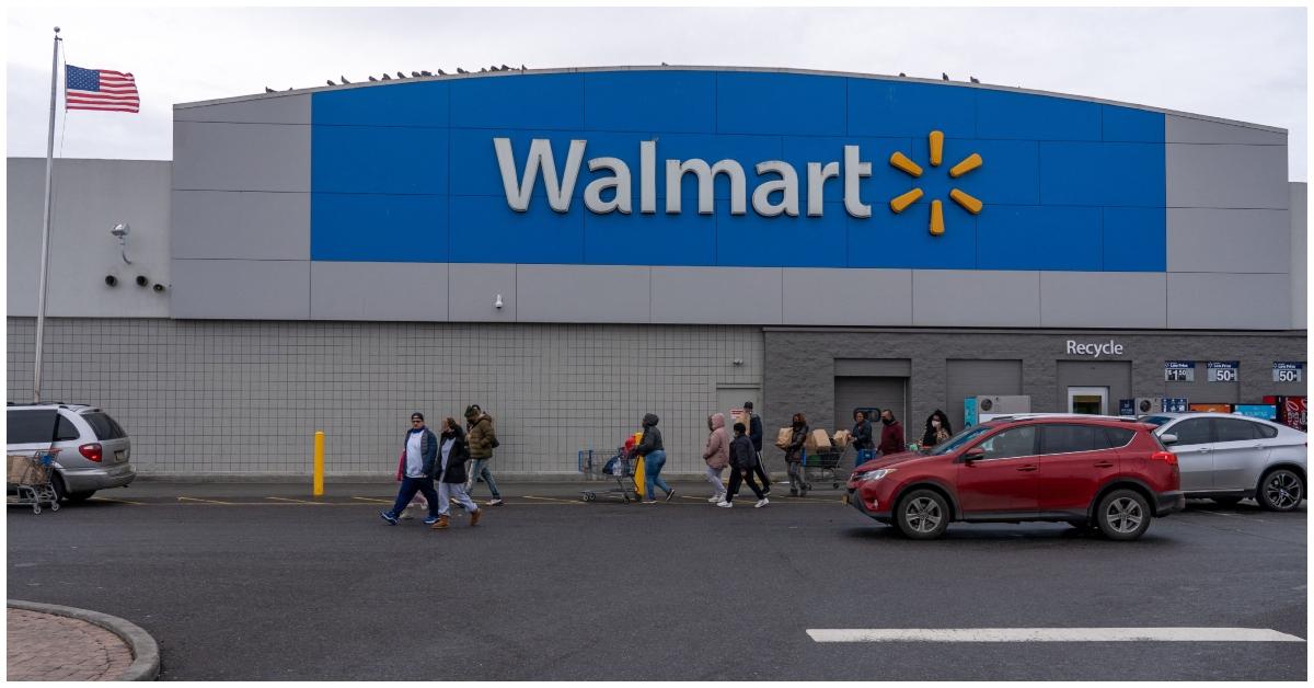 Customers walking outside of Walmart.