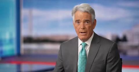 John Roberts on air in a suit and tie