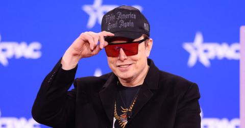 Elon Musk being interviewed in sunglasses at CPAC.