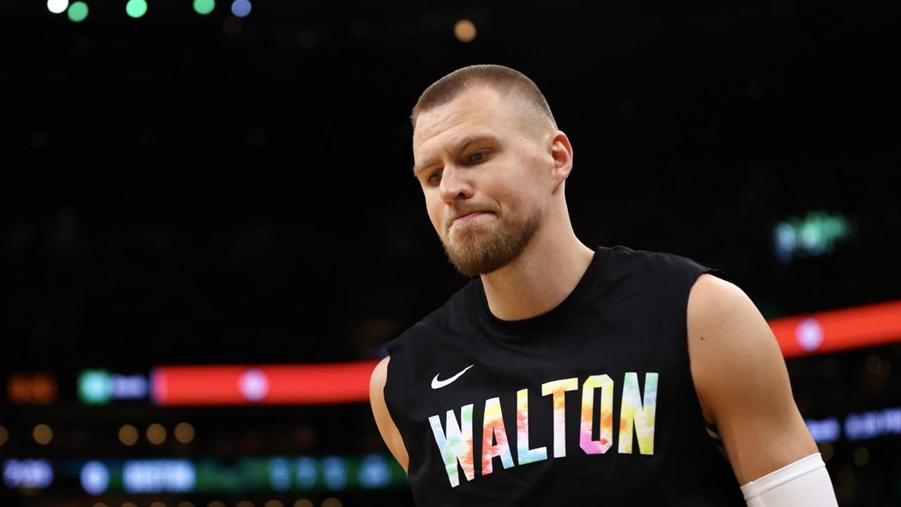 Kristaps Porzingis wears a shirt honoring former NBA player Bill Walton prior to Game One of the 2024 NBA Finals on June 6, 2024