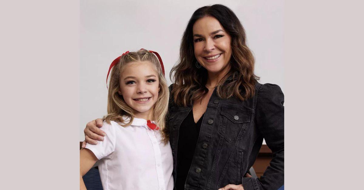 Ashlan smiles with her mother Lisa as a they pose for 'Dance Moms: A New Era' promo photo