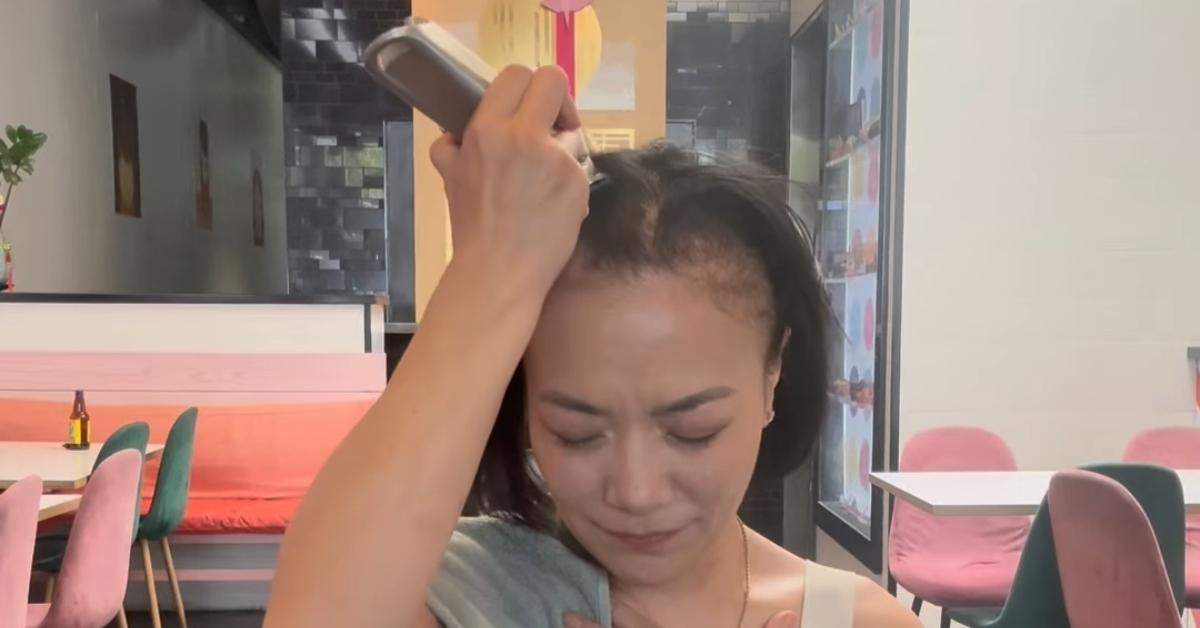Chef Shirley Chung shaving her head in July 2024