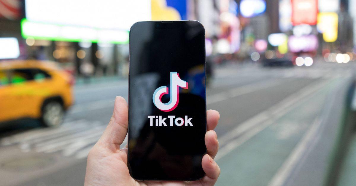 TikTok logo on a phone in New York City. 