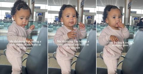 A baby girl finds a piece of gum at the airport and eats it