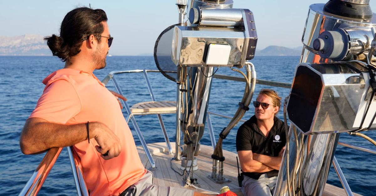 Colin MacRae and Gary King from ‘Below Deck Sailing Yacht’ talk on the deck of the Parsifal III