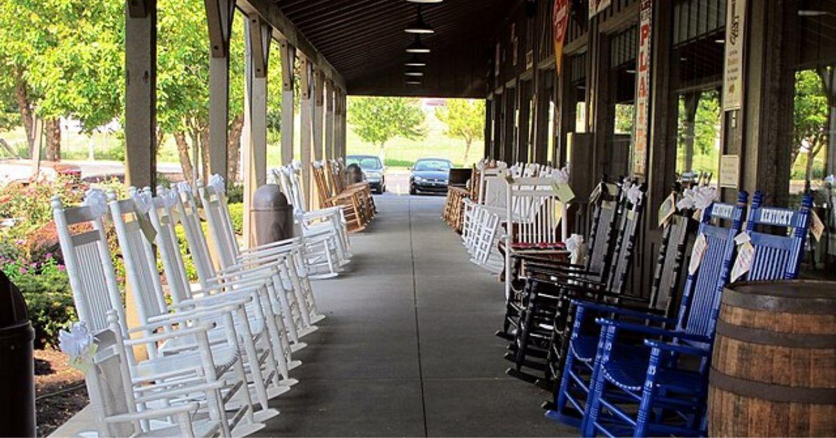 Cracker barrel rocking chairs outside of a store location. 