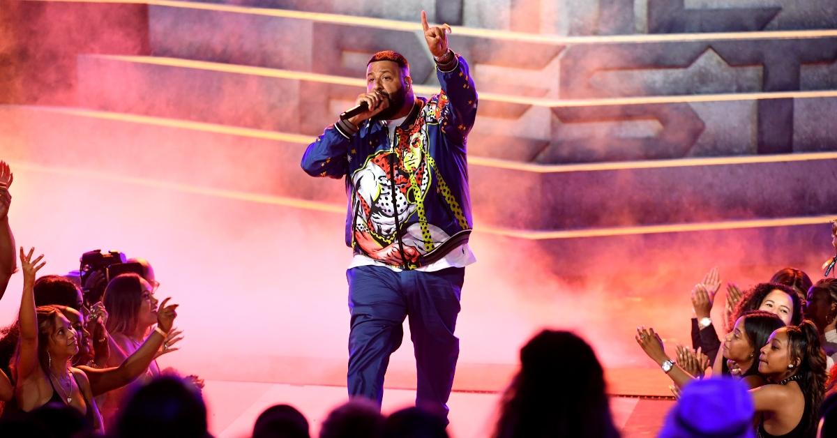 DJ Khaled wears colorful tracksuit on stage at the BET Awards.