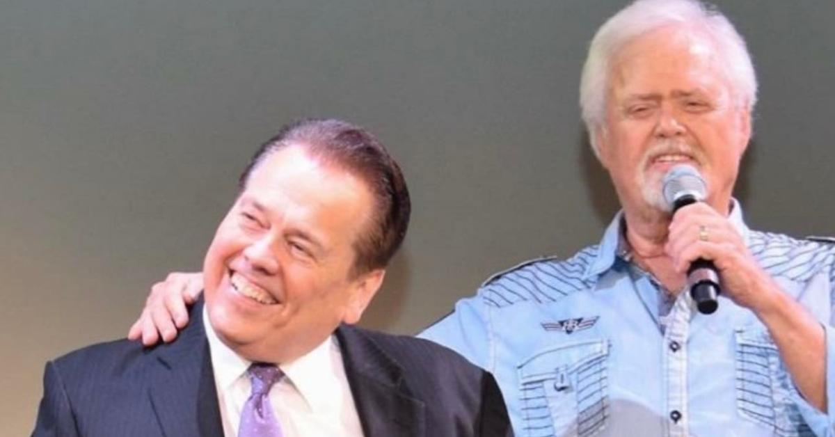 Alan and Merrill Osmond on-stage together.