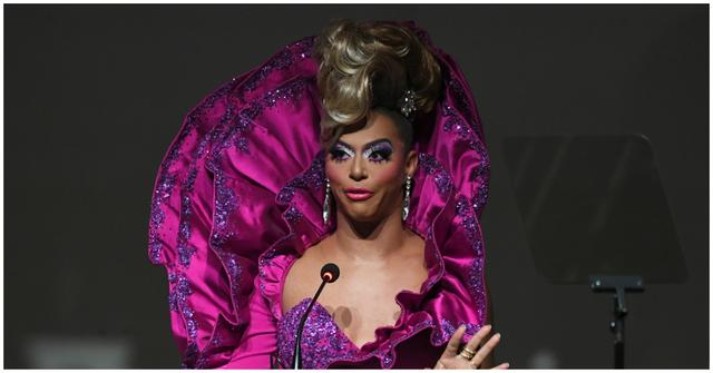 Shangela in fuchsia dress