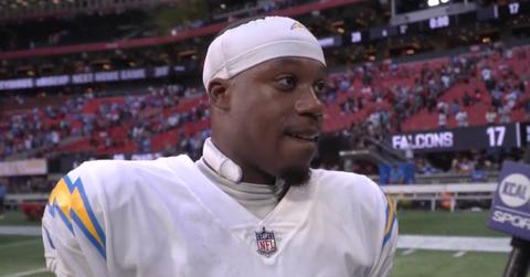 Los Angeles Chargers wide receiver Joshua Palmer sports a collar-like device on his neck.