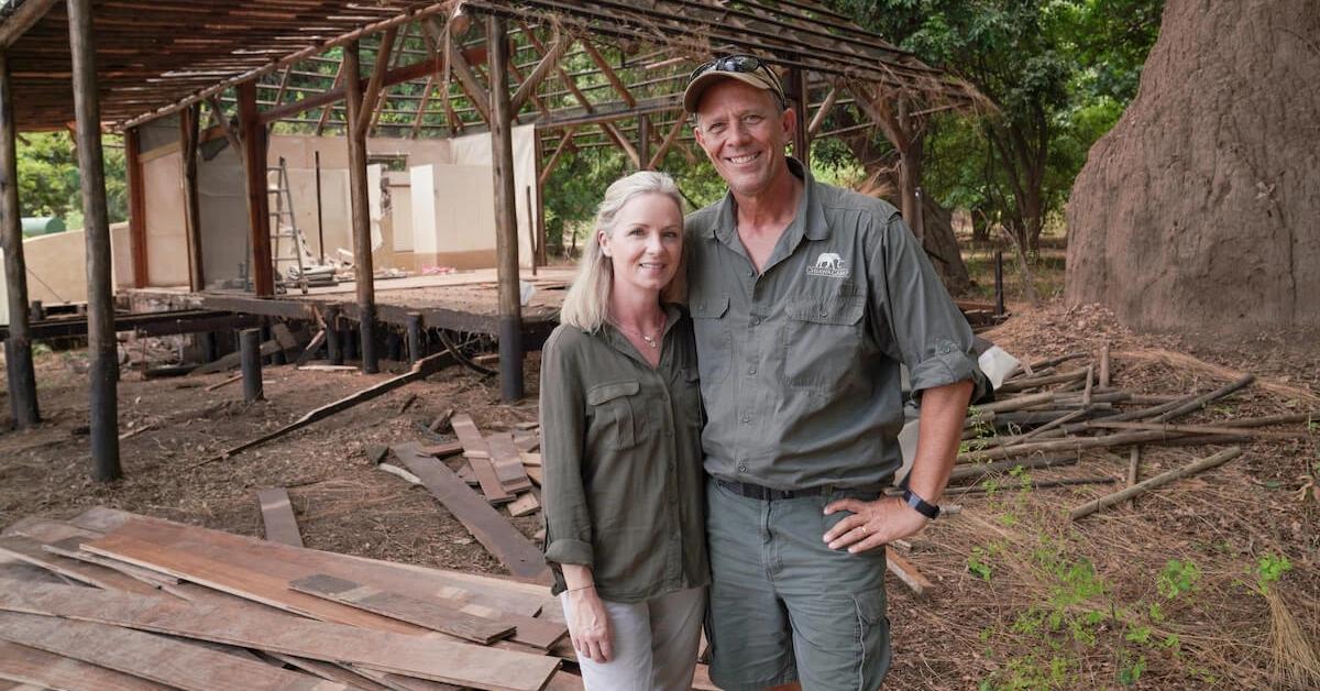 Lynsey and Grant Cumings pose near renovation site