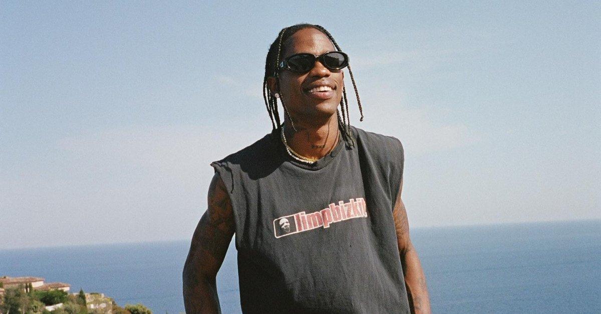 Travis Scott wearing a Limp Bizkit shirt and sunglasses