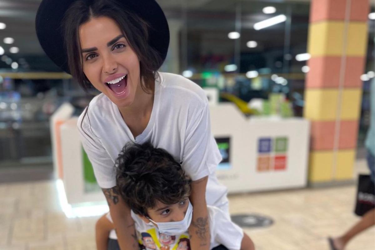 Sara Al Madani and her son