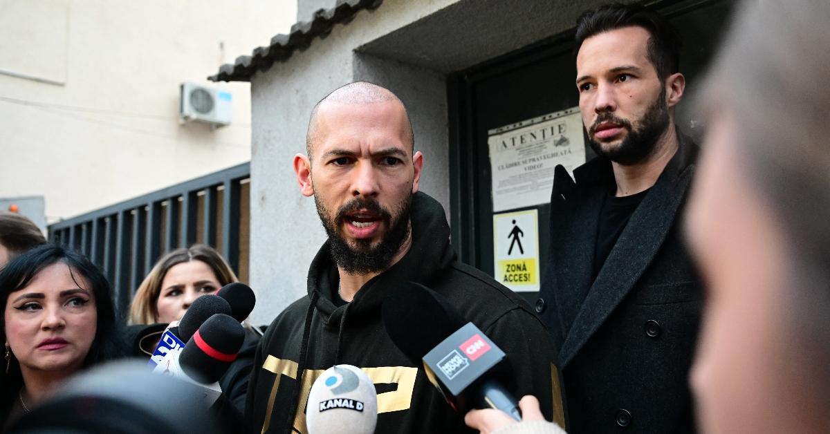  Andrew Tate (C) and his brother Tristan Tate (back R) speak to journalists after having been released from detention in Bucharest, March 2024