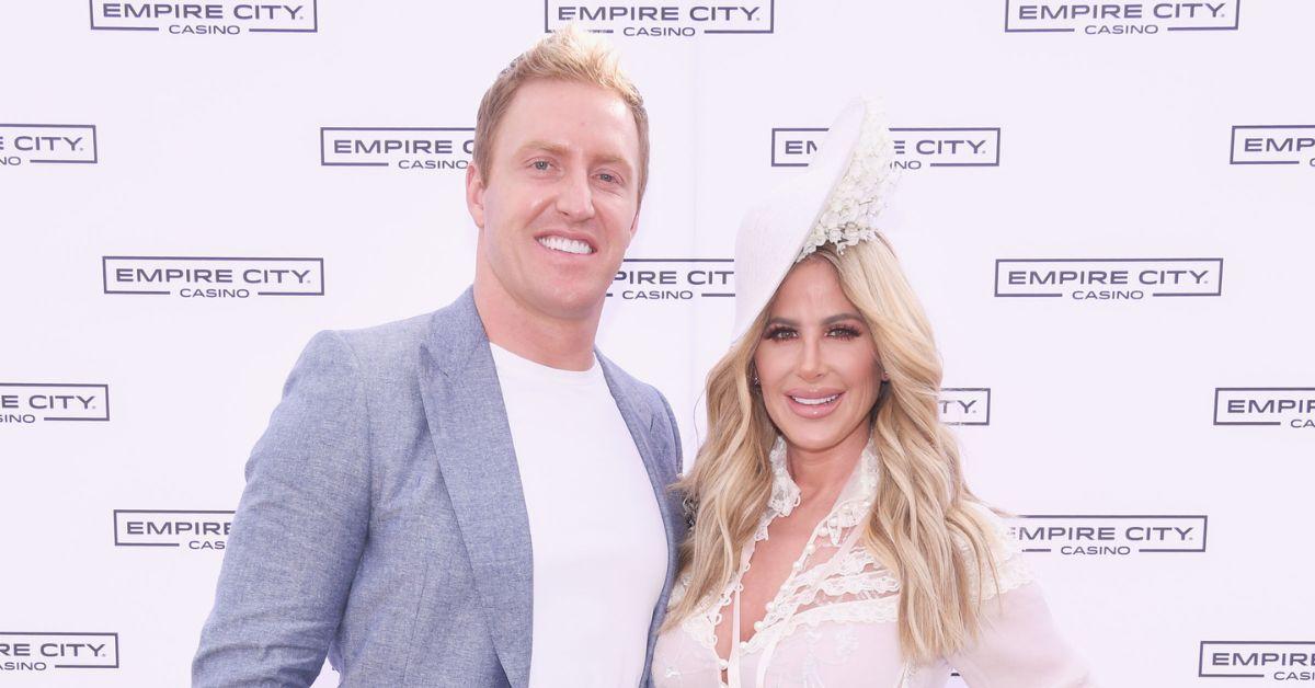 Kroy Biermann and Kim Zolciak smiling at the Kentucky Derby