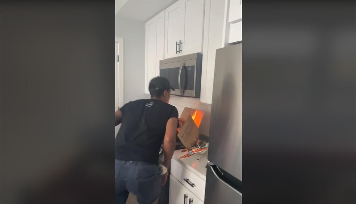 Woman starts fire from boxes stove apartment TikTok