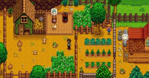 A player exploring their farm in Stardew Valley.