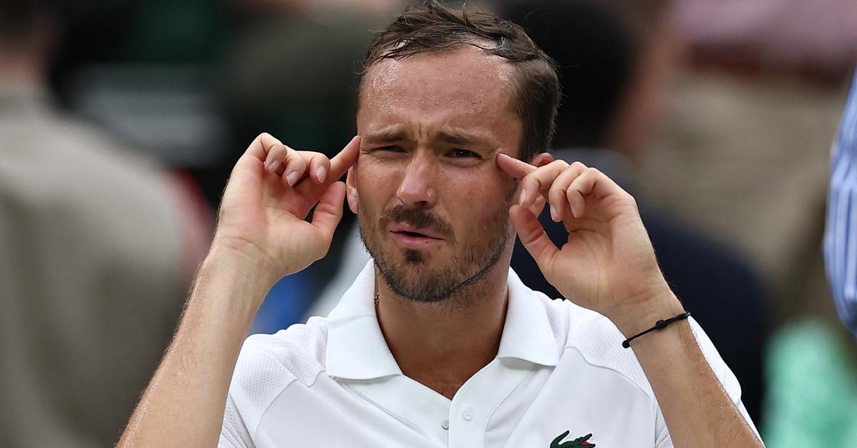 Russia's Daniil Medvedev gestures to his coach as he reacts after losing the first set to France's Alexandre Muller.