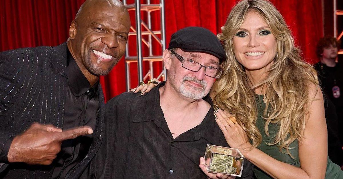 Terry Crews, Richard Goodall, and Heidi Klum showing off the Golden Buzzer