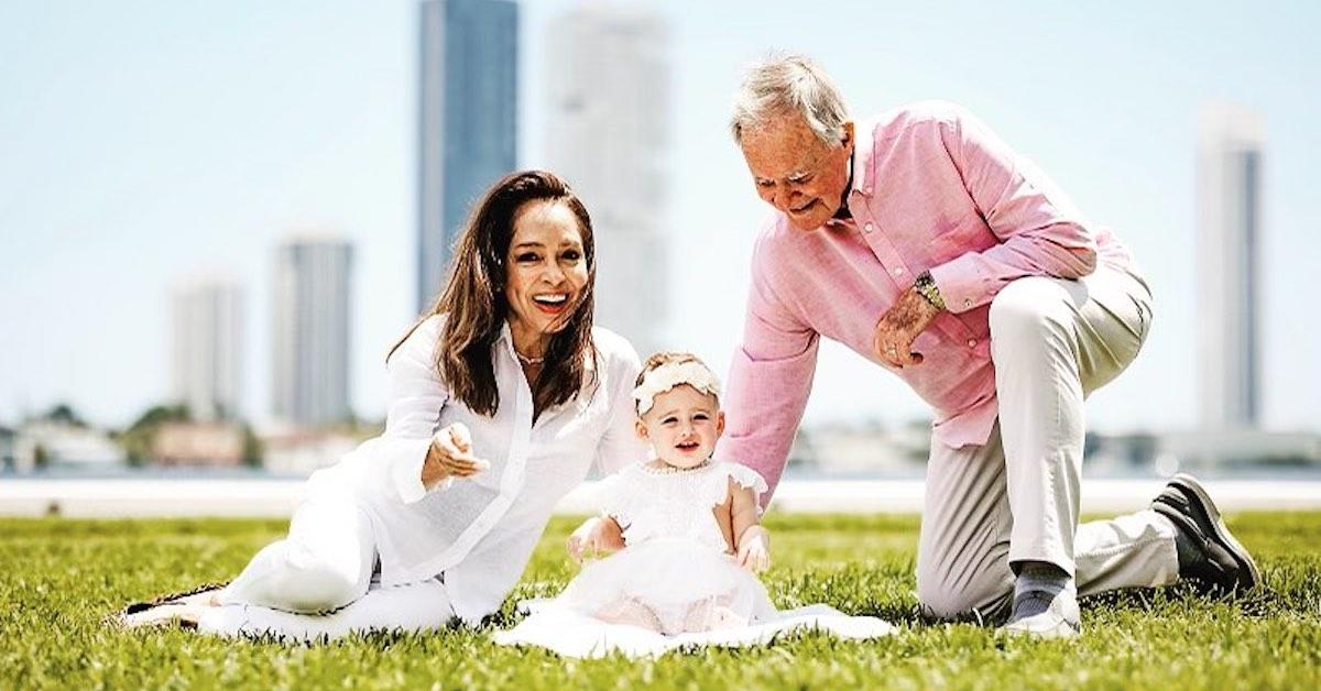 John Roland with his wife and granddaughter