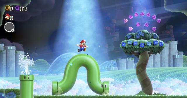 'Super Mario Bros. Wonder' Mario running over a worm-like green pipe.