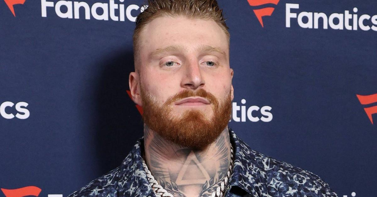 Maxx Crosby posing for a press photo