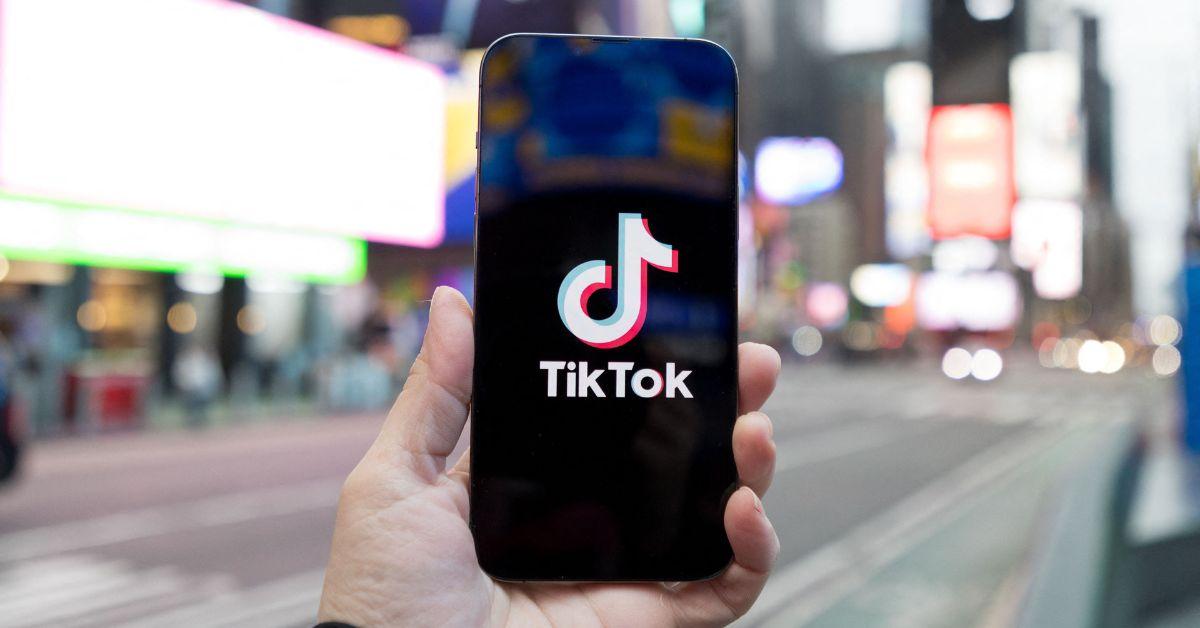 A TikTok logo on a phone in New York City. 