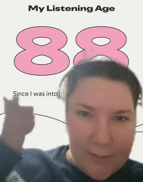 TikToker @kristenlynnslibrary reacts to a high Spotify wrap age