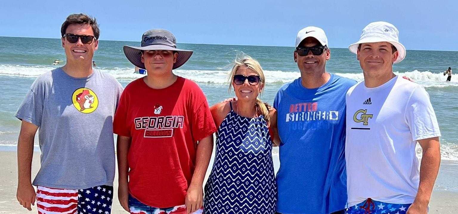 Geoff Duncan with his family at the beach