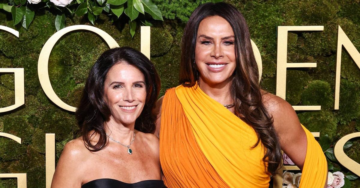 Karla Sofía Gascón (R) and her wife at the Golden Globes