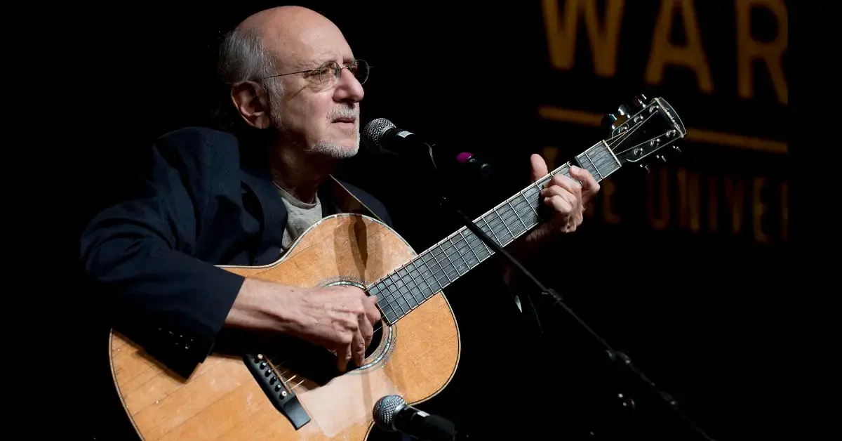 Peter Yarrow performs with his guitar