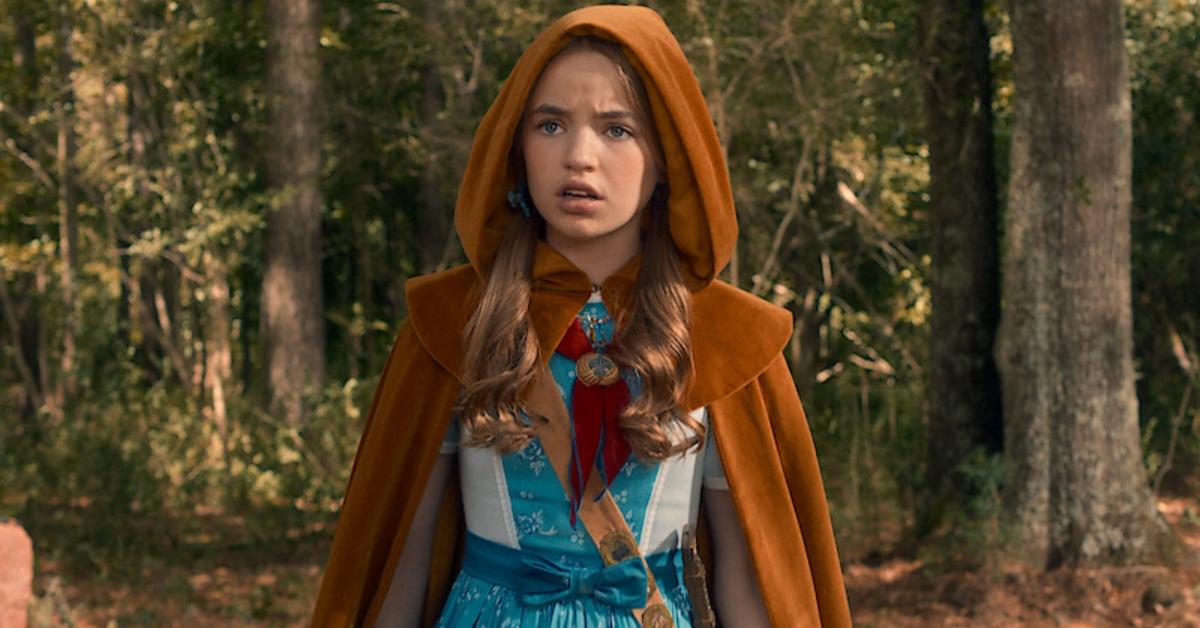 Holly explores the woods near Henry's house in Stranger Things.