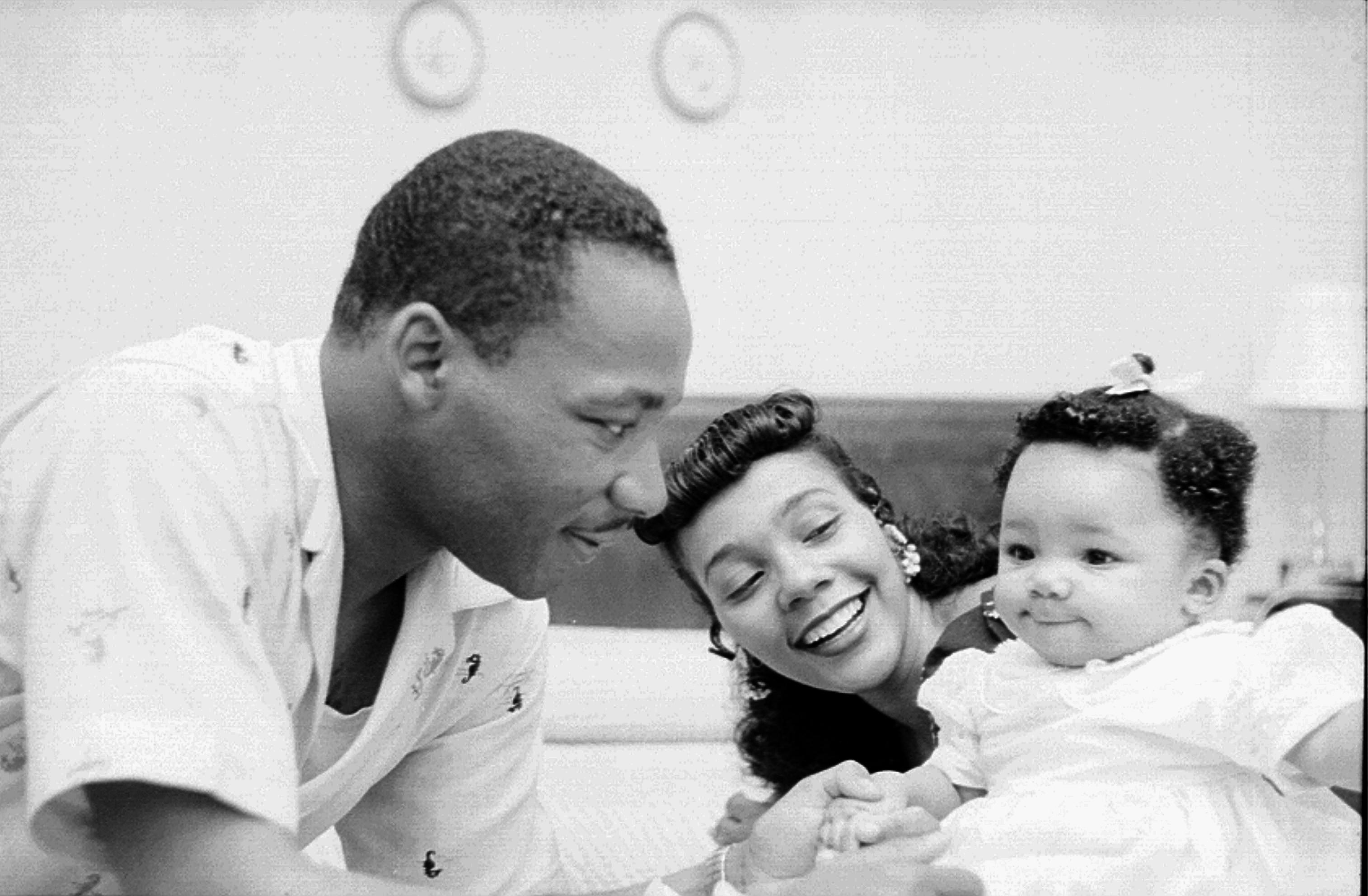 Martin Luther King, Jr. relaxes at home with his family in May 1956