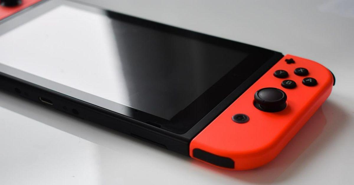 A Nintendo Switch console on a white countertop.