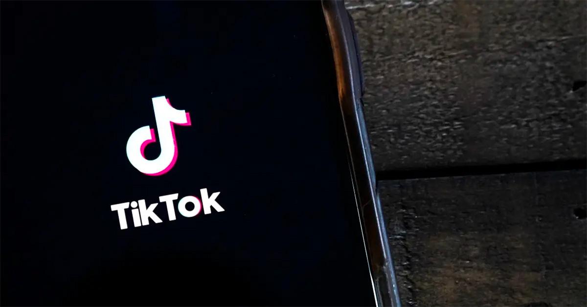 TikTok logo full screen on a phone screen. 