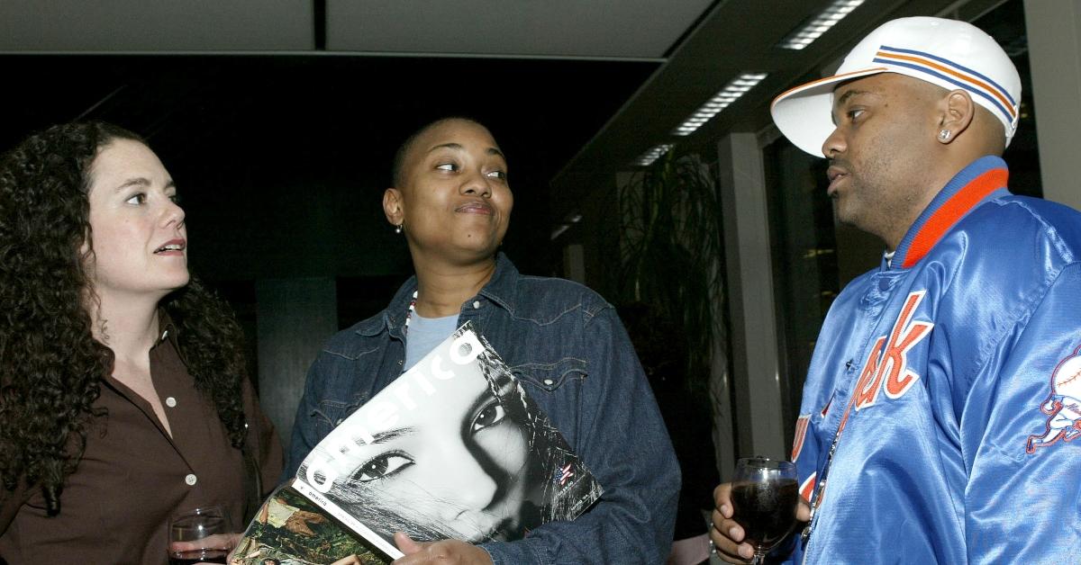 Lisa Hintelmann (L), Robyn Crawford and CEO of Roc-A-Fella Records/Rocawear Damon Dash look at a copy of Dash's new magazine 