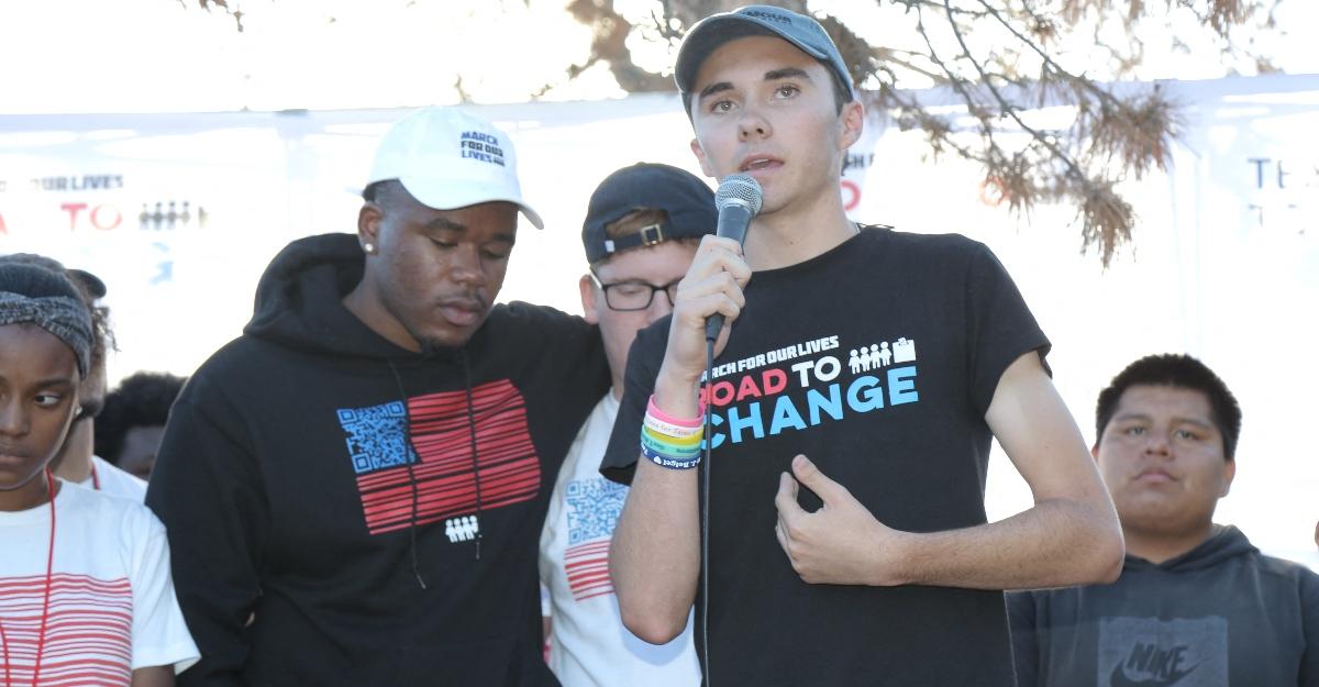 David Hogg speaking at a rally