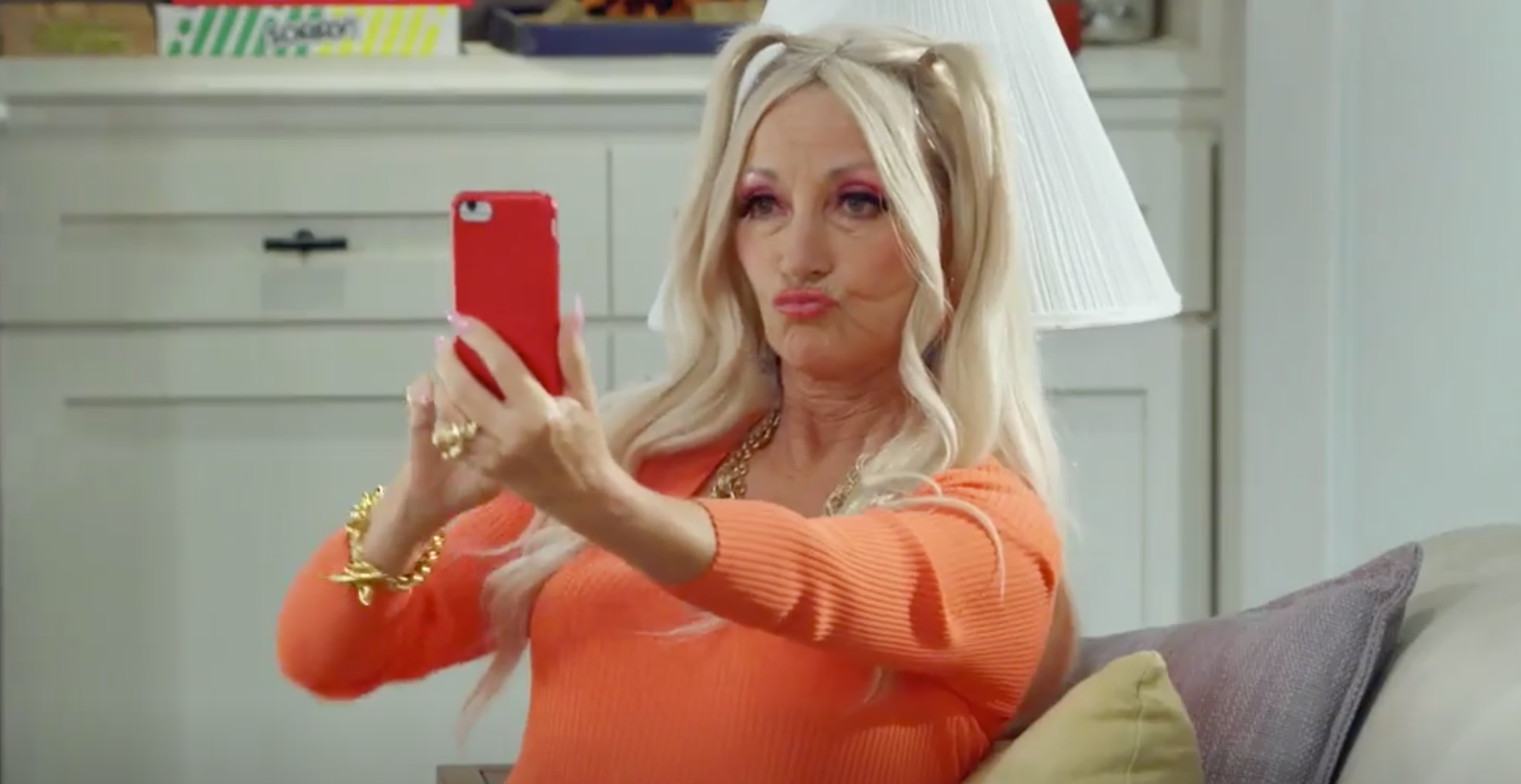 Bette taking a selfie of herself on 'B Positive'.