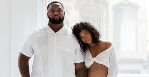 Model Chanel Iman and boyfriend Davon Godchaux pose in all white for a maternity shoot