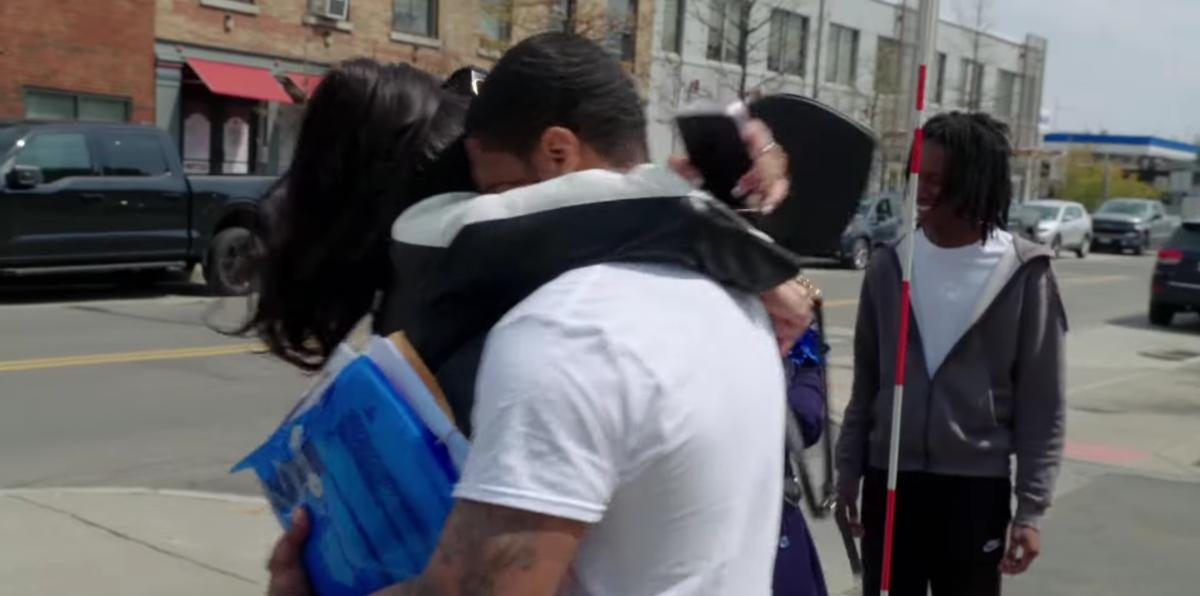 Zeruiah and Troy hug on the sidewalk on Love After Lockup