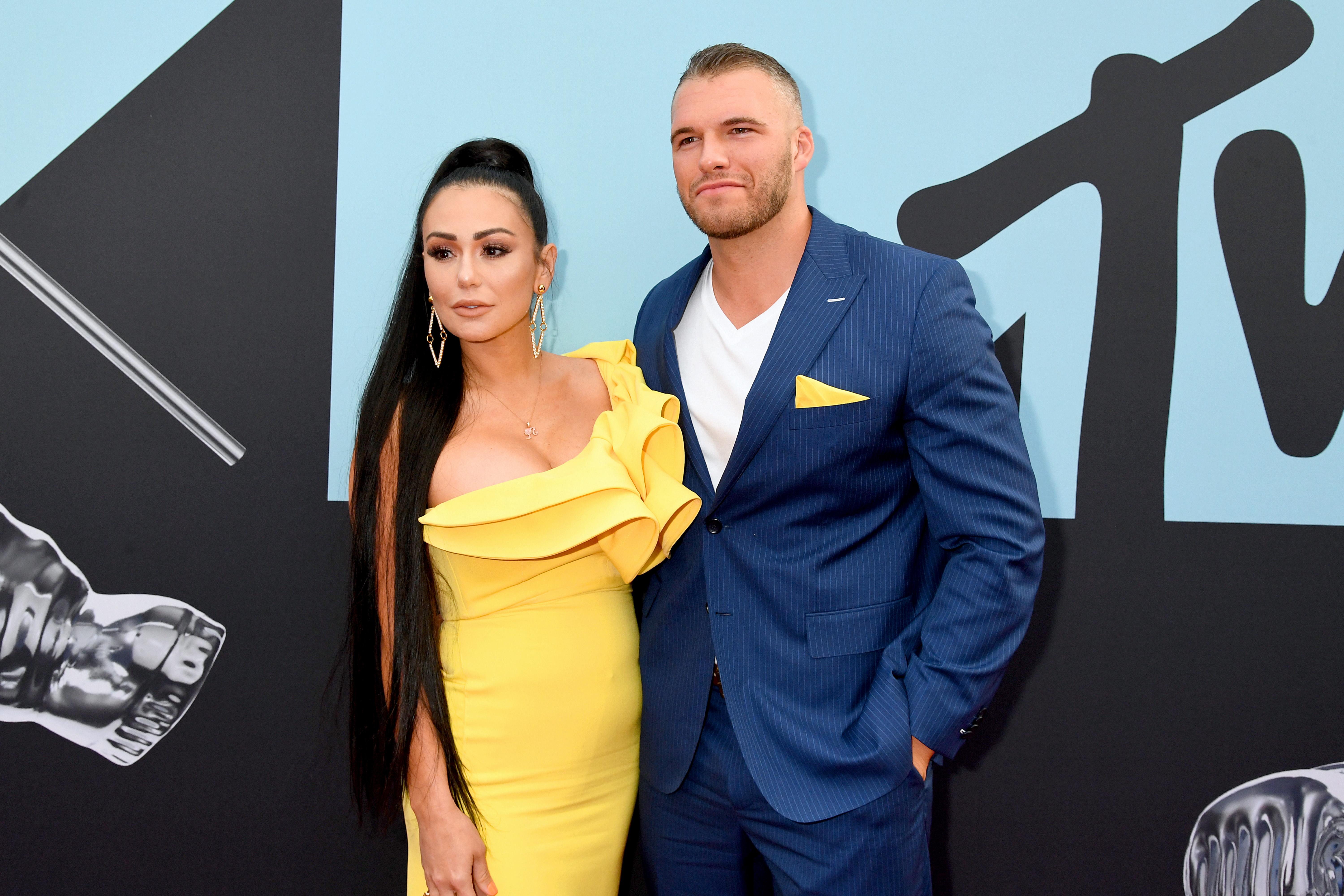 Jennifer Farley and Clayton Carpinello attend the 2019 MTV Video Music Awards in New Jersey.