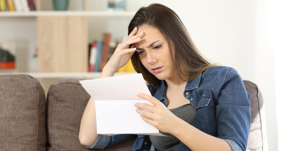 woman reading letter