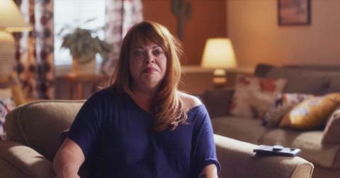 Deanna Thompson sits in an armchair on Don't F--k With Cats