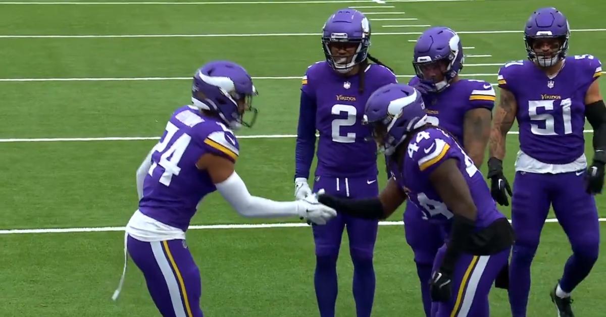 (l-r): Minnesota Vikings players Cam Bynum and Josh Metellus doing 'The Parent Trap' handshake